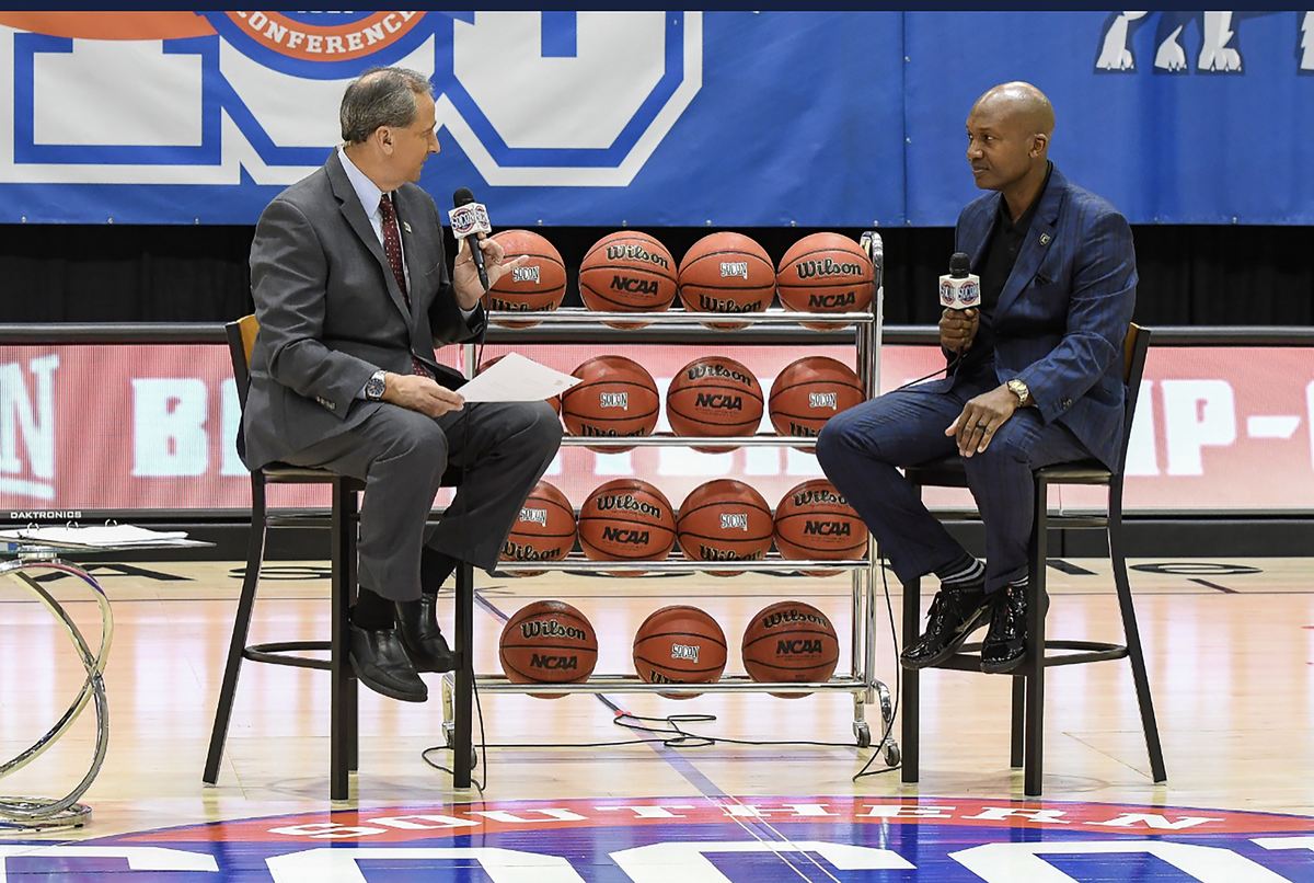Coach Oliver at a media day interview
